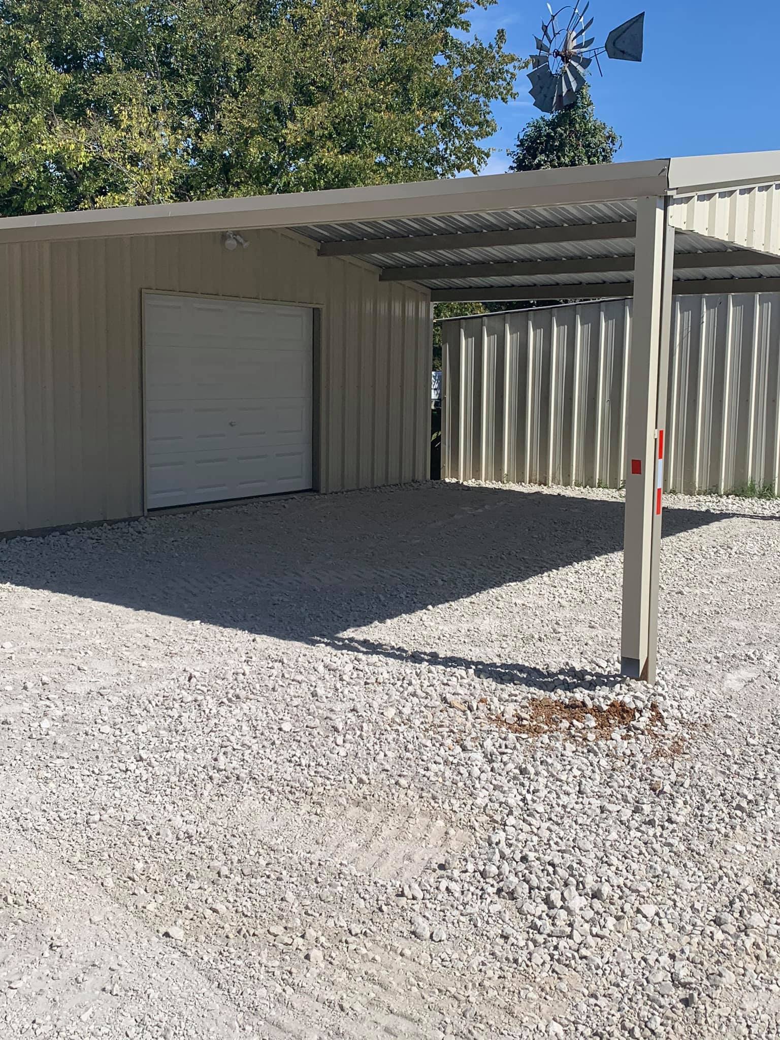 Metal Building and Covered Park and Gravel Covered Drive Way ~ David Neal Trucking